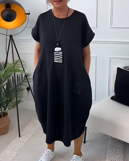 Bessie Relaxed Drop-Shoulder Short-Sleeve Dress with Pockets in Midi Length