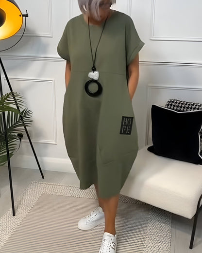 Bessie Relaxed Drop-Shoulder Short-Sleeve Dress with Pockets in Midi Length