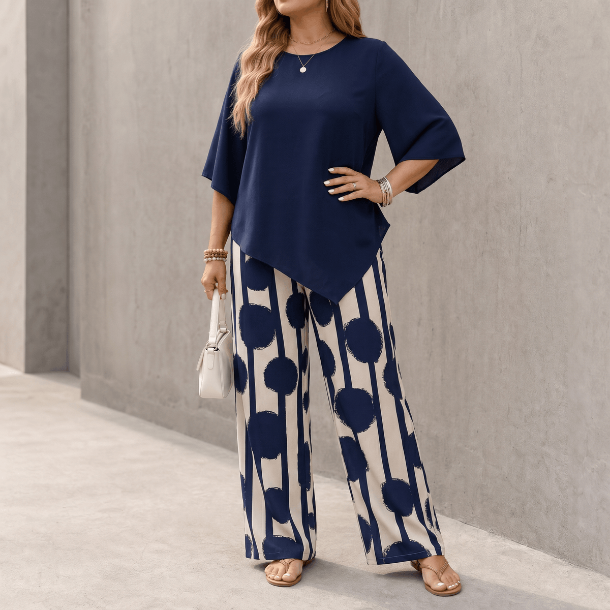 Women's Matching Two-Piece Set with Asymmetric Hem Top and Printed Wide-Leg Pants