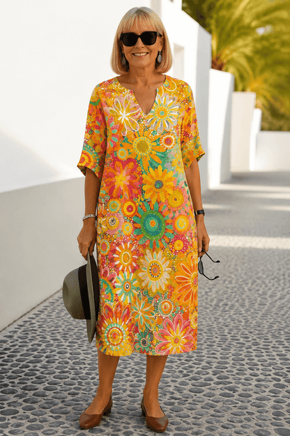 Nira Loose Midi Dress with Bold Floral Print and Notched V-Neck