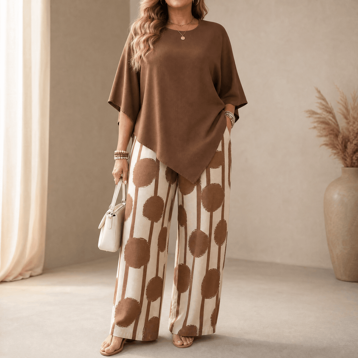 Women's Matching Two-Piece Set with Asymmetric Hem Top and Printed Wide-Leg Pants