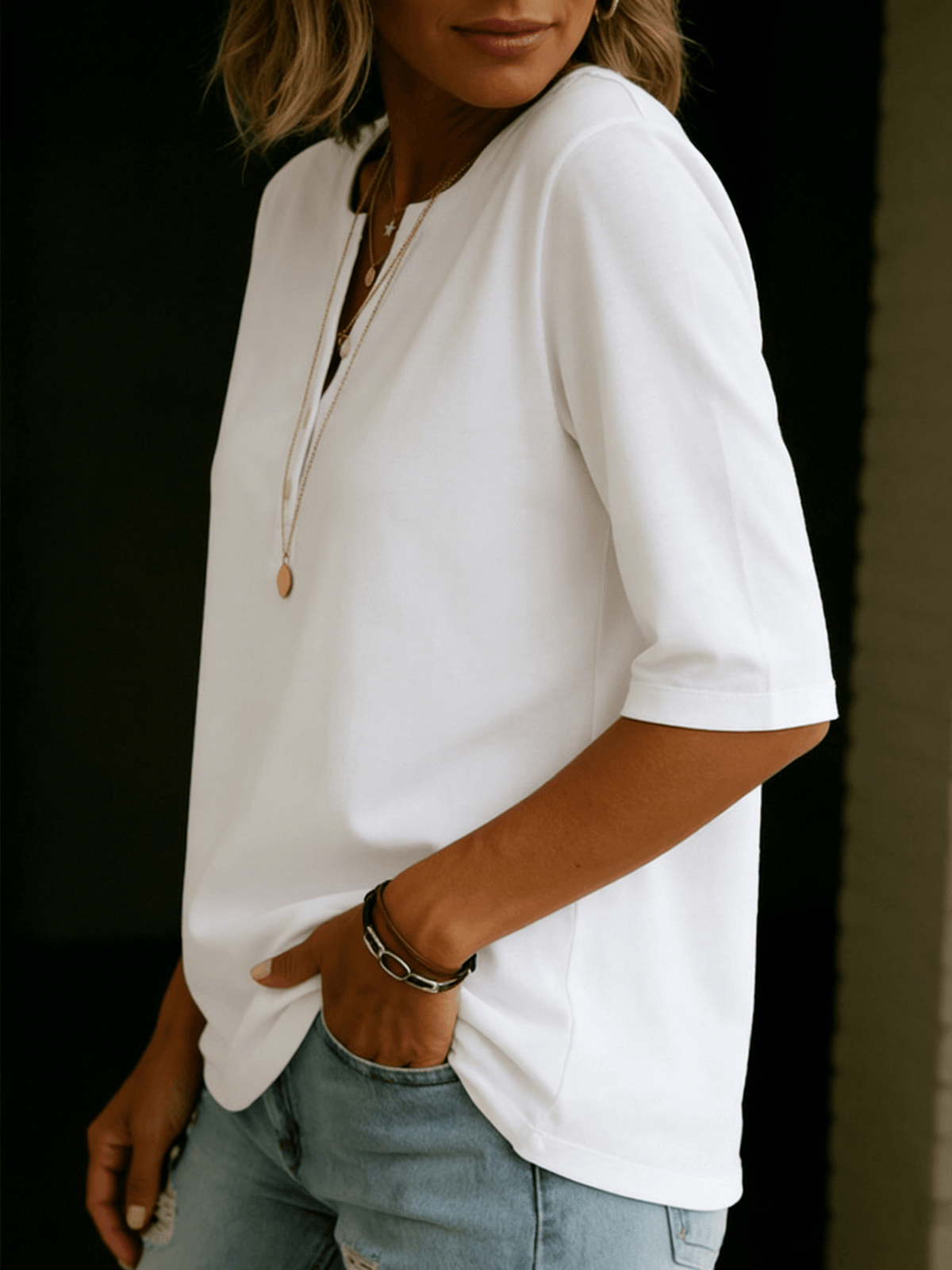 Relaxed Linen Henley Top with Half Sleeves and Button Placket