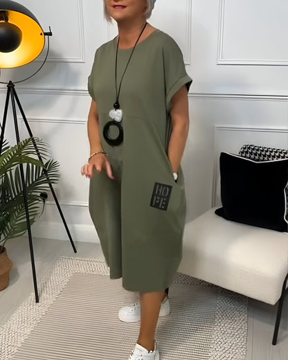 Bessie Relaxed Drop-Shoulder Short-Sleeve Dress with Pockets in Midi Length